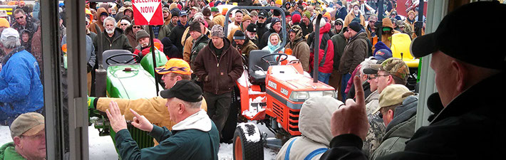 Vander Kolk Auction and Appraisal Company Auctioneer Scott Vander Kolk Jr. at the Voelker Implement Auction