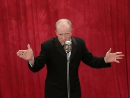 Let Vander Kolk Auction help your fundraising event. Scott Vander Kolk Jr. behind the microphone at a benefit auction.